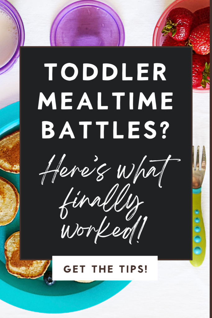 Poster with text "Toddler Mealtime Battles? Here’s what finally worked!" against a dark background. Around it, a blue plate with pancakes, a fork, and strawberries. Tone is helpful and inviting.